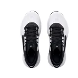 Championes de básquet Under Armour Lockdown 6, color blanco con detalles en negro y suela con diseño abstracto en blanco y negro.