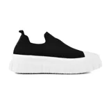 Zapatillas deportivas negras tipo slip-on, con capellada de tejido de punto y suela de plataforma blanca con diseño acanalado.