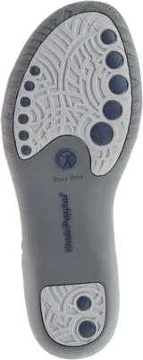 Sandalias Hush Puppies color gris con detalles en verde agua, con suela liviana y flexible.