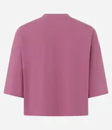 Remera cropped de algodón, color negro, con cuello redondo y mangas cortas.