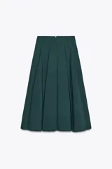 Falda midi verde oscuro con tablas, de tiro alto y cierre trasero con cremallera oculta.