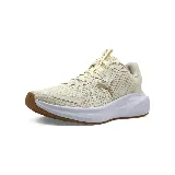Championes Puma Skyrocket Lite Alt color beige con logo dorado en el lateral y suela blanca con base marrón.