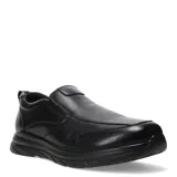 Zapato de vestir negro de cuero, sin cordones, con elásticos laterales y suela gruesa.