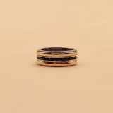 Anillo medio sin fin de plata 925 y oro con circonias negras.