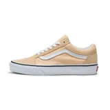 Championes Vans Ward de lona color beige con la clásica banda lateral blanca.