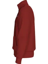 Buzo rojo con cuello alto, cierre de cremallera, dos bolsillos delanteros tipo canguro y logo de Tommy Hilfiger bordado en el pecho.