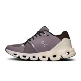 Championes de running On Cloudflyer 4, color lila con detalles en marrón, negro y blanco.