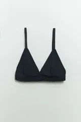 Soutien negro liso de poliamida sin aro con textura acanalada.