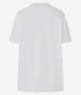 Remera blanca de algodón con cuello redondo y mangas cortas. Presenta una gran estampa central de un perro de raza cocker spaniel con un gran lazo rosa atado al cuello, y el texto "Do I look Pretty?" debajo.