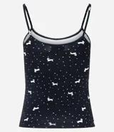 Musculosa de pijama confeccionada en microfibra color negro con estampa de lunares y perritos blancos. Tiene breteles finos fijos y picueta en el escote.