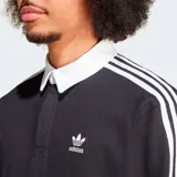 Camiseta Adidas Originals de manga larga, color negro, con cuello tipo polo blanco, cierre de botones y logo bordado en el pecho. Presenta las tres tiras características de la marca en color blanco a lo largo de las mangas.