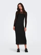 Vestido negro con lunares plateados, corte ajustado, largo a la rodilla, escote redondo y mangas largas de tul transparente.