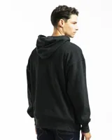 Buzo canguro verde con capucha y bolsillo frontal, de corte oversized.