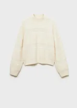 Sweater color crema con cuello perkins y paneles en contraste.