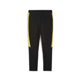 Pantalón de jogging negro con detalles en amarillo, logo de Puma bordado en amarillo y escudo del Club Atlético Peñarol bordado en amarillo.