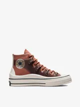 Championes Converse Chuck Taylor All Star Move de caña alta, color terracota con detalles transparentes y suela chunky blanca.