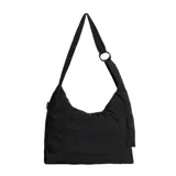 Bolso tipo hobo de tela color negro con bolsillo frontal y correa de hombro con detalle de aro metálico.