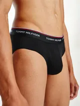 Pack de tres slips negros de algodón elástico con cintura elástica con logo Tommy Hilfiger.