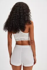 Bóxer blanco estilo masculino con cintura elástica con logo 'We The Free'.