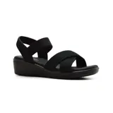 Sandalia con plataforma de goma color negro, con tiras elásticas cruzadas sobre el empeine y tira trasera elástica.