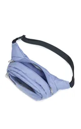 Riñonera JanSport Fifth Avenue negra con estampado de rayos blancos.