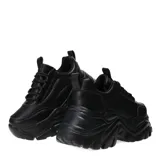 Zapatillas deportivas negras con plataforma gruesa y cordones.