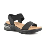 Sandalias bajas color rosa con plataforma blanca y detalle transparente en el talón.