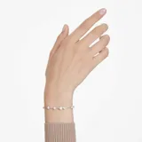 Pulsera plateada con cristales blancos y perlas.