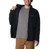 Campera Columbia de micropolar negro con cierre completo, bolsillos laterales con cierre y bolsillo en el pecho con cierre.