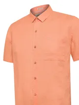 Camisa de manga corta RKF modelo Linenshort, color naranja, confeccionada en lino orgánico.