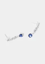 Aros colgantes de plata 925 con circonitas blancas y punto de luz azul.