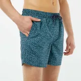 Short de baño azul con estampado de lunares blancos y cordón ajustable en la cintura.