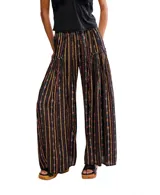 Pantalón palazzo de rayón con estampado de rayas verticales y motivos florales en tonos naranja, blanco y celeste.