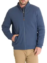 Campera azul de algodón orgánico con cierre frontal, cuello alto, bolsillos laterales y terminaciones en rib.