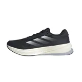 Championes de running Adidas Supernova Rise, color negro con detalles plateados y suela blanca.