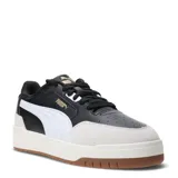 Championes urbanos Puma Shuffle Downtown, color negro con detalles en blanco y suela marrón.