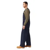 Pantalón de trabajo Dickies, tipo overol, confeccionado en denim color azul índigo.