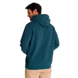 Buzo canguro verde oliva con capucha ajustable y cordones, bolsillo frontal y logo CAT estampado en blanco en el pecho.
