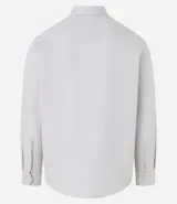Camisa blanca de algodón, manga larga con botonadura frontal y cuello camisero.