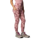 Calza larga deportiva con estampado abstracto en tonos rosados y morados. Confeccionada en tejido hidroabsorbente con corte de tiro alto y bolsillo lateral en la pierna.
