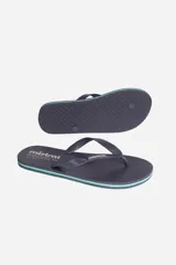 Ojotas de dedo color azul marino con detalle de línea verde en la suela.