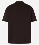 Remera de algodón peruano color mostaza, de corte recto, cuello redondo y manga corta.