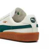 Championes Puma Army Trainer blancos con detalles en negro y gamuza gris. Suela de goma color caramelo.