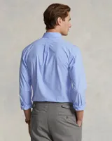 Camisa de hombre Polo Ralph Lauren, corte Custom Fit, confeccionada en popelina de algodón a cuadros celestes y blancos, con cuello abotonado y logo bordado en el pecho.