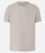 Remera de corte slim color beige, con cuello redondo, manga corta y tejido acanalado.