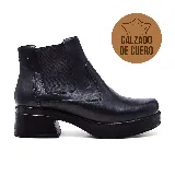 Botín Chelsea de cuero negro con elástico lateral, plataforma y taco cuadrado.