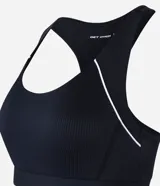 Top deportivo negro de microfibra con espalda estilo nadador y friso contrastante blanco.