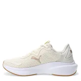 Championes Puma Skyrocket Lite Alt color crema con logo en dorado y suela blanca con base marrón.