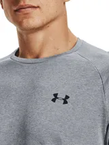 Remera deportiva Under Armour Tech 2.0 de hombre, color gris jaspeado con logo negro en el pecho.