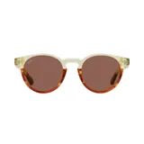 Lentes de sol con montura redonda de acetato color crema y marrón carey, con lentes marrones.